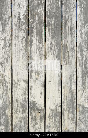 Wood texture creating a nice abstract surface with old white scratched paint. Stock Photo