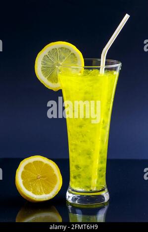Lemon slushie cups decorated with lemon isolated on black Stock Photo