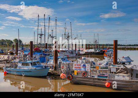 Vessels at the Steveston Fishermans Wharf advertising the arrival of Spot Prawns in British Columbia Canada Stock Photo