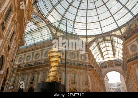 milan italy 3 may 2021: cup awarded to the winner of the 2021 cycling tour of italy on display in the vittorio emanuele gallery in milan Stock Photo
