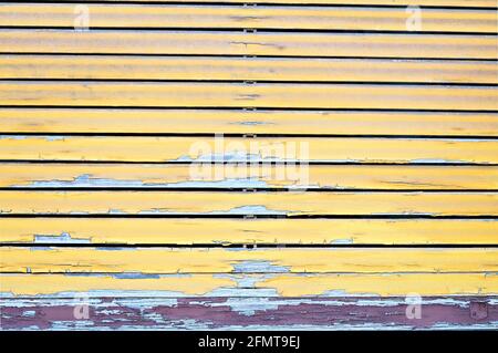 roller shutter ruined and stripped from the weather Stock Photo