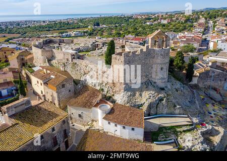 Medieval stone castle of Catalonia on the rock in Spain. Main landmark of Calafell town Stock Photo