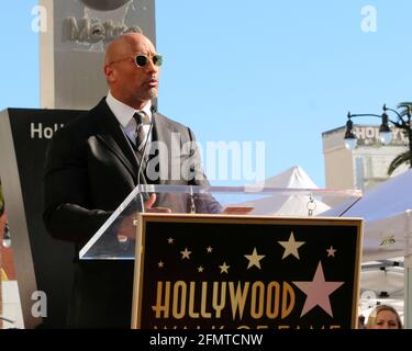 LOS ANGELES - DEC 13:  Dwayne Johnson at the Dwayne Johnson Star Ceremony on the Hollywood Walk of Fame on December 13, 2017 in Los Angeles, CA Stock Photo