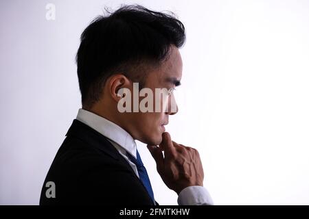 Side view Silhouette of  thinking businessman. Stock Photo