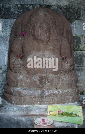 Blitar, East Java, Indonesia - April 10th, 2021 : Ancient Statue on Penataran temple Stock Photo