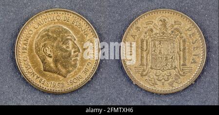 A one peseta coin from Spain dated 1953 during the reign of General Franco. The Peseta was once the currency of Spain but it became obsolete with the Stock Photo