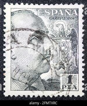 SPAIN - CIRCA 1939: A stamp printed in Spain shows portrait of General Francisco Franco (1892-1975), circa 1939 Stock Photo