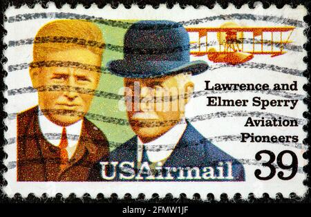 UNITED STATES OF AMERICA - CIRCA 1986: A stamp printed in USA shows Lawrence and Elmer Sperri Aviation Pioneers circa 1992. Stock Photo