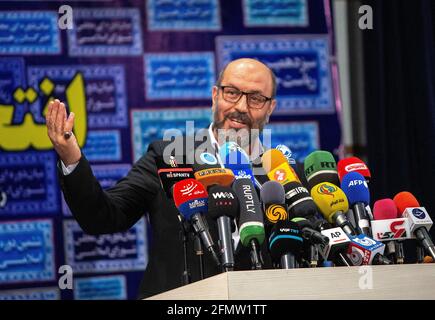 Tehran, Iran. 11th May, 2021. Former Iranian Defense Minister Hossein Dehghan attends a press conference after he registered his candidacy for the 13th presidential race at the Interior Ministry in Tehran, Iran, on May 11, 2021. Iran's Ministry of Interior Affairs on Tuesday officially started registering candidates for the 13th presidential race, state TV reported. Credit: Ahmad Halabisaz/Xinhua/Alamy Live News Stock Photo