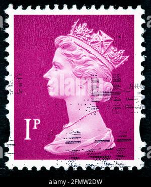 UNITED KINGDOM - CIRCA 1980: Postage stamp printed in England shows a portrait of Queen Elizabeth II circa 1980 Stock Photo