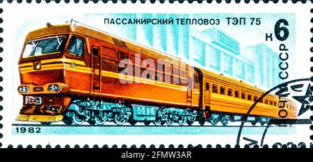 SOVIET UNION - CIRCA 1982: Mail stamp printed in the former Soviet Union featuring an electrified locomotive train, circa 1982 Stock Photo