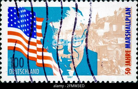 GERMANY - CIRCA 1997: a stamp printed in the Germany shows George C. Marshall US general and statesman Marshall Plan 50th Anniversary circa 1997 Stock Photo