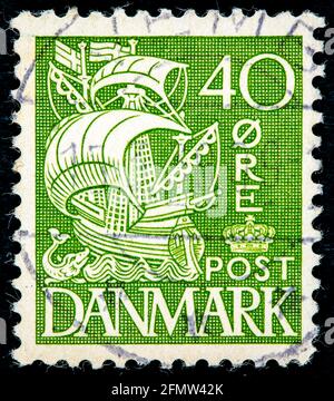 DENMARK - CIRCA 1927: A stamp printed in the Denmark depicts the caravel circa 1927 Stock Photo