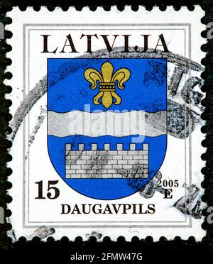 LATVIA - CIRCA 2007: A stamp printed in Latvia from the 'Coat of Arms' issue shows Daugavpils coat of arms, circa 2007. Stock Photo