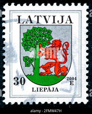 LATVIA - CIRCA 2007: A stamp printed in Latvia from the 'Coat of Arms' issue shows Liepeja coat of arms, circa 2007. Stock Photo