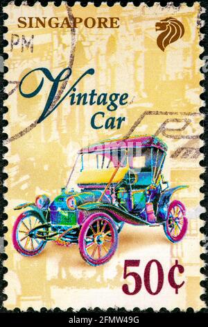 SINGAPORE - CIRCA 1997: A stamp printed in Singapore shows Vintage Car, circa 1997 Stock Photo