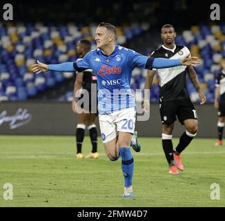 Naples, Italy. 11th May, 2021. Napoli's Piotr Zielinski celebrates his goal during a Serie A soccer match between Napoli and Udinese in Naples, Italy, May 11, 2021.The match ended 5-1. Credit: Stringer/Xinhua/Alamy Live News Stock Photo