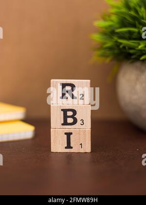 Assam, india - March 30, 2021 : Word RBI written on wooden cubes stock image. Stock Photo
