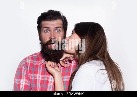 Funny couple shaving. Barbershop beard care. Bearded man getting haircut by hairdresser. Barber scissors and straight razor. Stock Photo