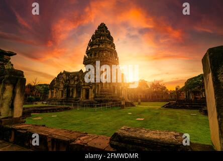 Selective focus on Phimai Historical Park with sunset sky. Landmark of Nakhon Ratchasima, Thailand. Travel destinations. Historic site is ancient. Stock Photo