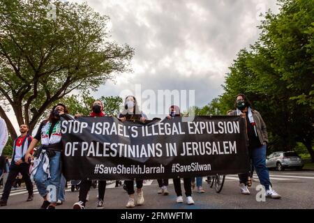 Washington, DC, USA, 11 May, 2021.  Pictured: Demonstrators carry a banner demanding that the expulsion of Palestinians in the Sheikh Jarrah and Silwan neighborhoods be stopped.  Credit: Allison C Bailey / Alamy Live News Stock Photo