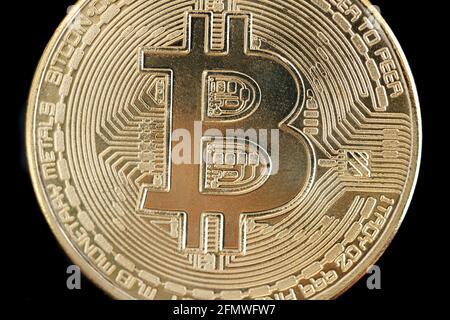 Bitcoin isolated on black background. Selective focus. Stock Photo