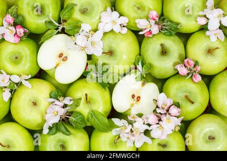 Apples fruits green apple fruit background with leaves and blossoms food Stock Photo