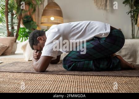 African Ethnicity Woman and Associates Lying on Mats Practicing Balasana  Stock Photo - Image of child, energy: 174216656