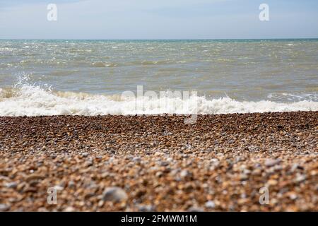Waves breaking on the shore Stock Photo