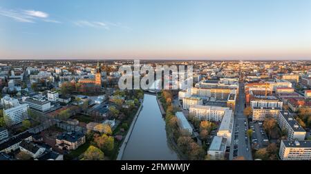 Aerial panorama of Turku city center, Cathedral of Turku and Aura river in spring in Finland. Stock Photo