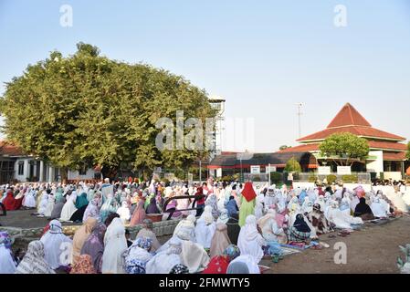 Majalengka, West Java, Indonesia - July 31, 2020 : Indonesian muslims woman attend Eid Al-Adha prayers in a yard at a local mosque Stock Photo