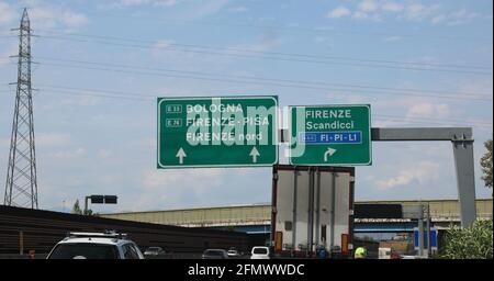 big road signs at a motorway junction with directions to reach Bologna Florence Pisa in ITALY Stock Photo