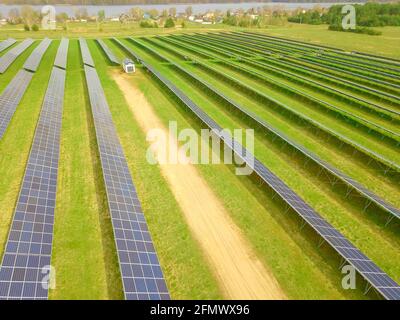 Drone view of a solar power plant on a sunny day. Solar farm system ...