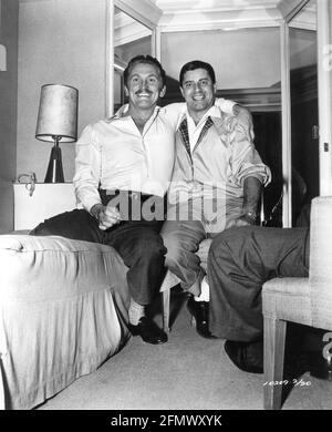 KIRK DOUGLAS with visitor JERRY LEWIS in his Dressing Room during filming  of GUNFIGHT AT THE O.K. CORRAL 1957 director JOHN STURGES screenplay Leon  Uris music Dimitri Tiomkin producer Hal B. Wallis Wallis-Hazen / Paramount  Pictures ...