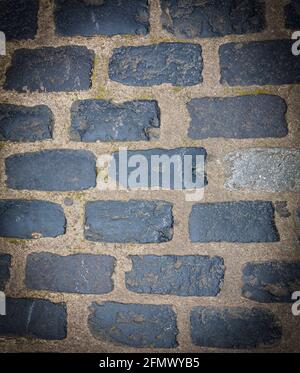 The Paving blocks made of asymmetrical stone. Close up Stock Photo