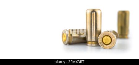 Bullet isolated on white background, banner with ammo for a gun, for 9mm pistol, close-up view photo Stock Photo