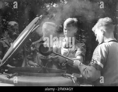 Nazism / National Socialism, organisations, Hitler Youth (HY) during food counter, standard-bearer with gorget, circa 1940, EDITORIAL-USE-ONLY Stock Photo