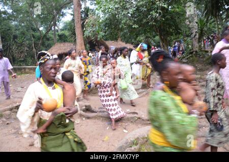 Osun Osogbo: Osun Priestesses initiating the children into Osun traditional religion. Stock Photo