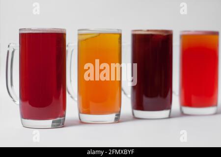craft and colored beer set in mugs isolated Stock Photo