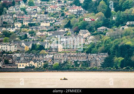 Arnside, Cumbria, UK. 12th May, 2021. A Coastguard Search and Rescue jet ski from Arnside, a hovercraft and lifeboat from Morecambe and a Coastguard helicopter from Carmarthen, Wales sprang in to action after a report of people caught on a sandbank (or possibly birds) near Grange-over-Sands, Cumbria. Happily it turned out to be the birds. Credit: John Eveson/Alamy Live News Stock Photo