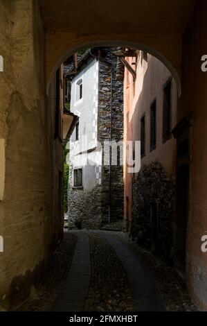 Narrow street in typical alpine village, Valle Maggia, Ticino, Switzerland. Stock Photo