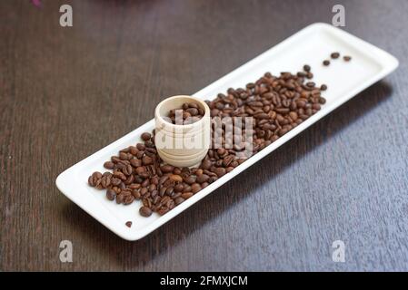 Coffee Beans with wooden mortar Stock Photo