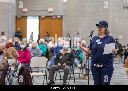 Jackson, Michigan, USA. 11th May, 2021. A woman gives her viewpoint as the Independent Citizens Redistricting Commission holds its first public hearing in advance of redrawing the maps for Michigan's Congressional and legislative districts. The Commission was established by the Voters Not Politicians ballot initiative, passed in 2018, which aimed to end gerrymandering by taking the redistricting power away from the legislature. Credit: Jim West/Alamy Live News Stock Photo