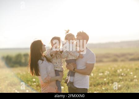 Portrait Of Happy Family In outdoor. sunset  Stock Photo