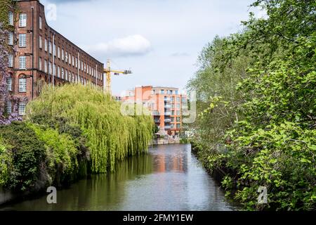 A view down the River Wensum in the city of Norwich captured from White Friars road bridge Stock Photo