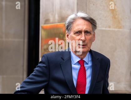 London, UK. 12th May, 2021. Philip Hammond, Baron Hammond of Runnymede PC is a life peer who served as Chancellor of the Exchequer from 2016 to 2019, Foreign Secretary from 2014 to 2016, and Defence Secretary from 2011 to 2014. A member of the Conservative Party, he was the Member of Parliament (MP) for Runnymede and Weybridge from 1997 to 2019. Credit: Ian Davidson/Alamy Live News Stock Photo