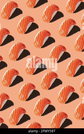Food pattern of nigirizushi with salmon on pinkish background Stock Photo