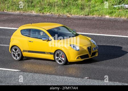 2009 Alfa Romeo Mito Veloce T 155; Vehicular traffic, moving vehicles, cars, vehicle driving on UK roads, motors, motoring on the M6 motorway highway UK road network. Stock Photo