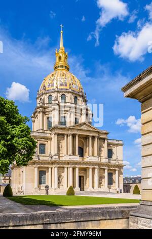 Facade of the Dome des Invalides in Paris, France, with its golden cupola, a former church which houses the tomb of Napoleon Bonaparte. Stock Photo