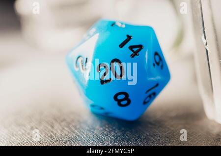 Close-up image of a blue role-playing game. Focus only on the number 20 Stock Photo